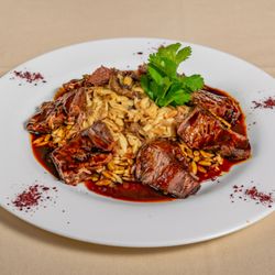 Chinar On The Island - Our beautifully tender short rib with mushroom orzo.