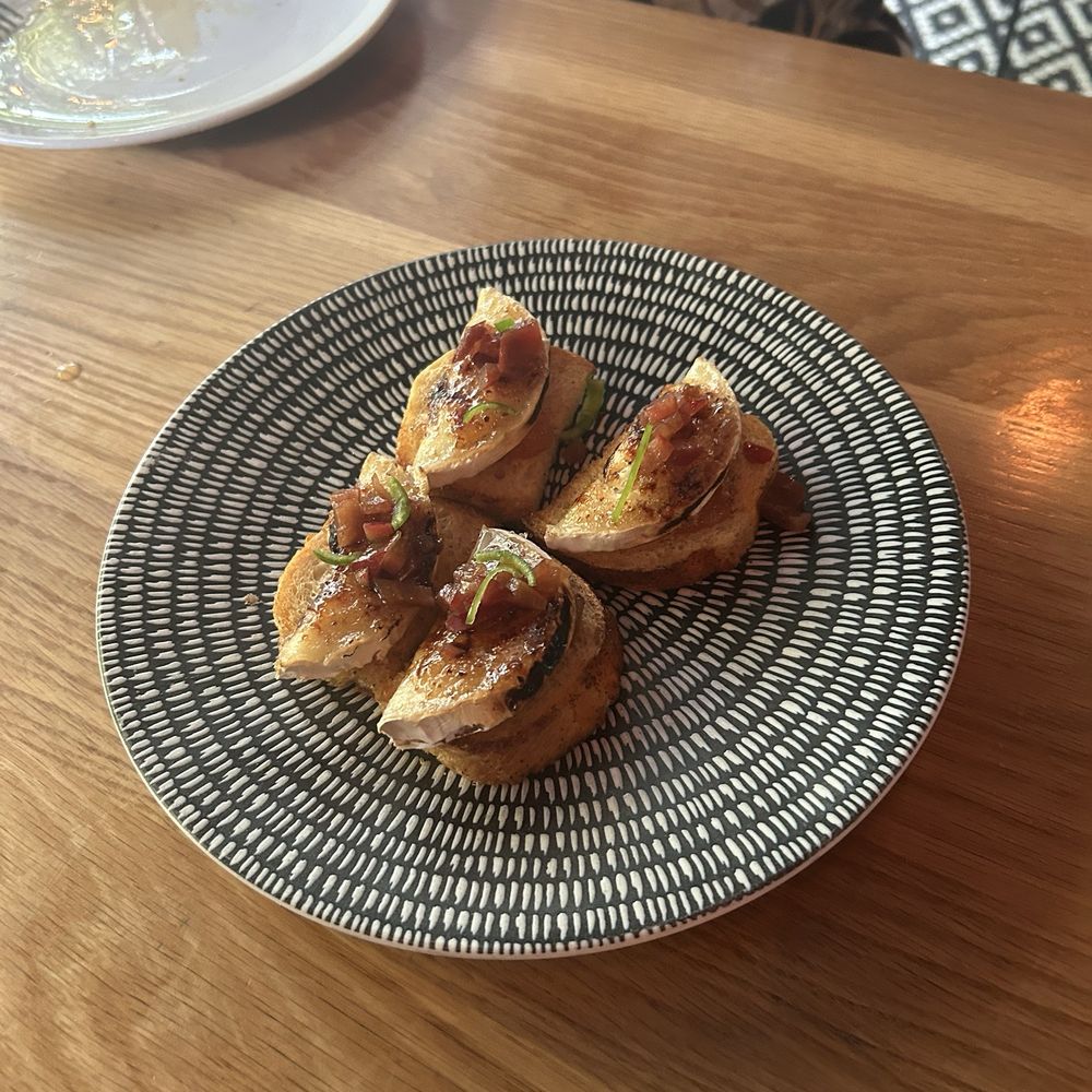 Cooks & Soldiers - Bruleed goat cheese on toast with fig jam - Spanish Near Me - Atlanta, Georgia Cooks & Soldiers - Bruleed goat cheese on toast with fig jam - Spanish Near Me - Atlanta, Georgia