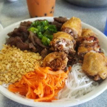 Hoang My - BBQ Pork vermicelli with egg rolls and a Thai milk tea - Vietnamese Near Me - Houston, Texas Hoang My - BBQ Pork vermicelli with egg rolls and a Thai milk tea - Vietnamese Near Me - Houston, Texas