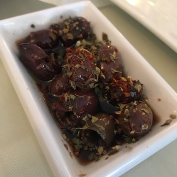 Pi On Sunset - They put down some very flavorful small olives once we sat down, with dried herbs sprinkled on top - Mediterranean Near Me - Granada Hills, California Pi On Sunset - They put down some very flavorful small olives once we sat down, with dried herbs sprinkled on top - Mediterranean Near Me - Granada Hills, California