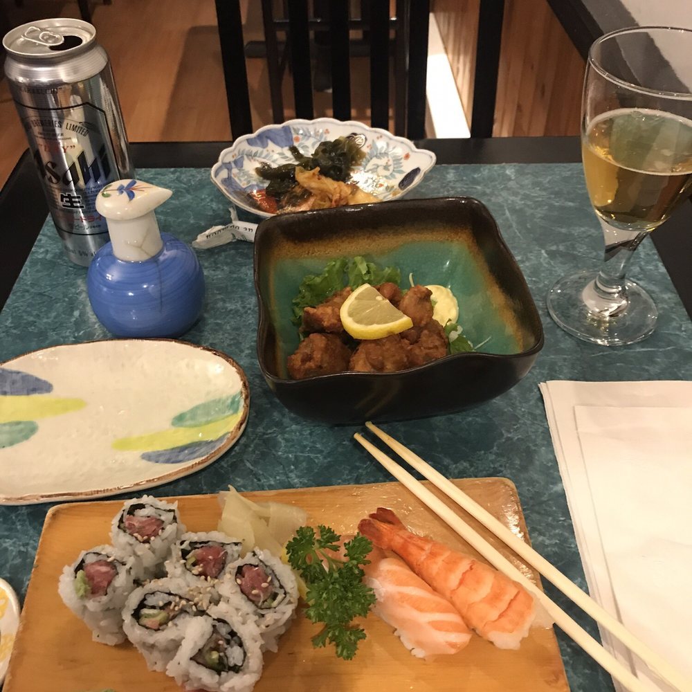 Beer, chicken karage, negi toro maki, ebi and sake Beer, chicken karage, negi toro maki, ebi and sake