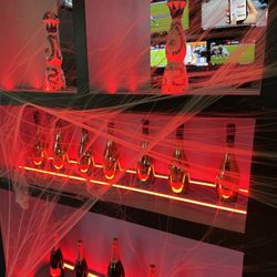 Trophy Chest Sports Bar and Club - Dallas - Ace bottles decor