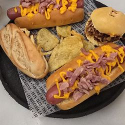 100 Montaditos - Hot dog ham and cheese, pulled pork slider, chicken kebab with shredded potatoes
