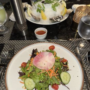 Prime Cut Steakhouse - My friend's local green salad topped with a beautifully placed watermelon, radish, and half dozen order of oyster - Steakhouses Near Me - Jamul, California Prime Cut Steakhouse - My friend's local green salad topped with a beautifully placed watermelon, radish, and half dozen order of oyster - Steakhouses Near Me - Jamul, California