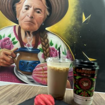 Con Azucar Cafe - Mazapan iced latte, forgot the name of the warm drink and a mini concha - which was from their mini pastry assortment bags. - Coffee & Tea Near Me - Salinas, California