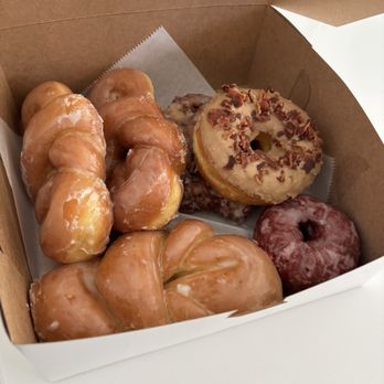 NC Jelly Donuts - The holiday family pics!!! My mom still raves about the apple fritter (under the maple bacon) - Donuts Near Me - Burlington, North Carolina