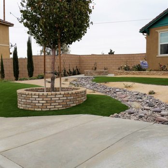 JNR Home Improvements - Drought tolerant, low maintenance desertscape with EasyTurf synthetic lawn highlights keep this curb appeal always looking great. - Landscaping Near Me - Palmdale, California