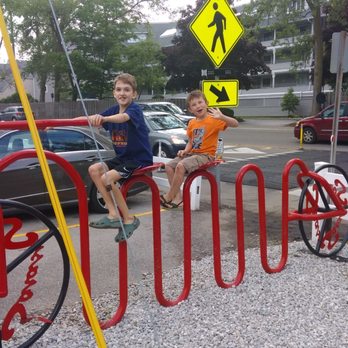 Sara's - Colton and Roman pretending to ride a bike - Burgers Near Me - Erie, Pennsylvania Sara's - Colton and Roman pretending to ride a bike - Burgers Near Me - Erie, Pennsylvania