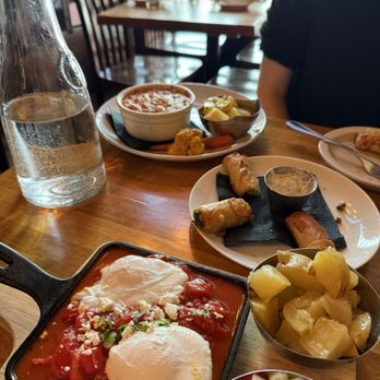 Kashkaval Garden - Shakshouka (front), artichoke strata (back) - Mediterranean Near Me - New York, New York