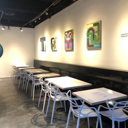 Ground floor seating area with art pieces for sale/display. Very clean and staff sanitized area as I sat gobbling down my food! Ground floor seating area with art pieces for sale/display. Very clean and staff sanitized area as I sat gobbling down my food!