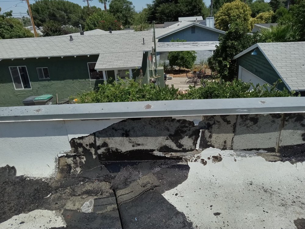 Slide of Ronald's Roofing