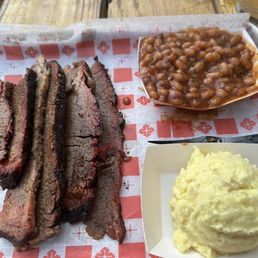 Brisket, potato salad and baked beans. Took photo after a couple of bites.