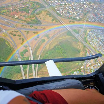 Mauna Loa Helicopter Tours - Oahu, Hawaii. Private helicopter tour with doors off. Rainbow below us. - Aerial Tours Near Me - Honolulu, Hawaii Mauna Loa Helicopter Tours - Oahu, Hawaii. Private helicopter tour with doors off. Rainbow below us. - Aerial Tours Near Me - Honolulu, Hawaii