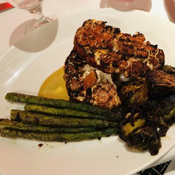 Jeff Ruby's Steakhouse - Cincinnati - Cauliflower steak with asparagus and sprouts. - Steakhouses Near Me - Cincinnati, Ohio Jeff Ruby's Steakhouse - Cincinnati - Cauliflower steak with asparagus and sprouts. - Steakhouses Near Me - Cincinnati, Ohio