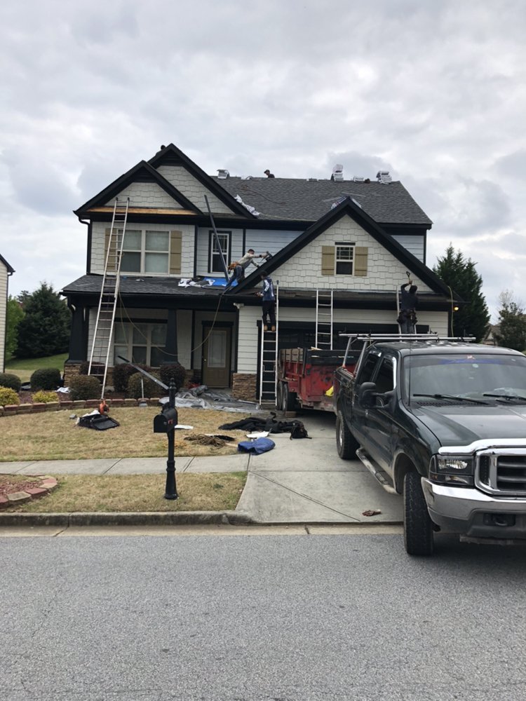 Slide of MTZ Roofing