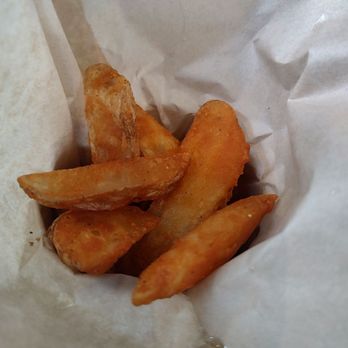 Fadó Irish Pub - Fries under the fish - Irish Pub Near Me - Atlanta, Georgia Fadó Irish Pub - Fries under the fish - Irish Pub Near Me - Atlanta, Georgia