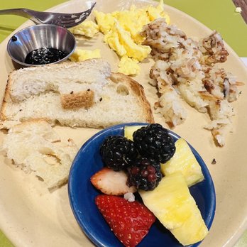 Snooze, an A.M. Eatery - Kids scrambled egg and toast (our daughter had already started eating by the time I took the picture ) - Breakfast & Brunch Near Me - Addison, Texas