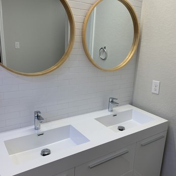 Santana Painting Services - Double sink with round copper mirrors on white tiled wall - Painters Near Me Santana Painting Services - Double sink with round copper mirrors on white tiled wall - Painters Near Me