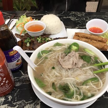 Saigon Noodles - Large Pho tai, egg rolls and a grilled beef rice plate. So Yummy! - Vietnamese Near Me - Salinas, California