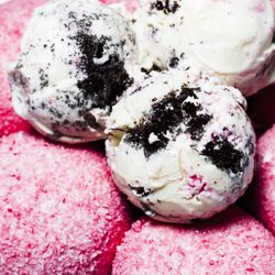 Boombalatti's Handcrafted Ice Cream - SNOWBALL! A Toasted marshmallow ice cream with chocolate cake chunks, coconut flakes and pink sanding sugar. Available in January!
