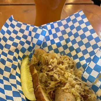 Big Bear Lake Oktoberfest - German Sausage served on a pretzel roll with sauerkraut on top. Dill pickle spear on the side. Very flavorful. First time having it. - Festivals Near Me - Big Bear Lake, California Big Bear Lake Oktoberfest - German Sausage served on a pretzel roll with sauerkraut on top. Dill pickle spear on the side. Very flavorful. First time having it. - Festivals Near Me - Big Bear Lake, California
