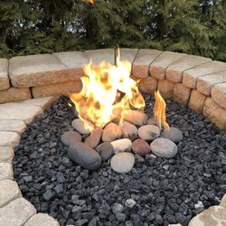 Mapes Landscaping and Snow Removal - Fire pit installed by Luke Mapes .