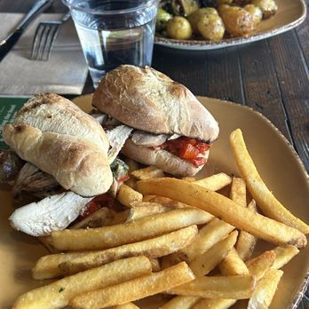 Urban Plates - Grilled Cage Free Chicken Sandwich French Fries - New American Near Me - Brea, California Urban Plates - Grilled Cage Free Chicken Sandwich French Fries - New American Near Me - Brea, California