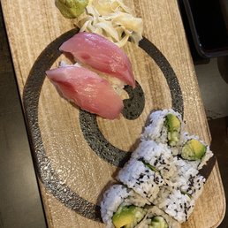 Avocado and cucumber roll and yellow tail sashimi