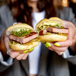 Gilde Brewery - Leberkäse Sliders: Seared leberkäse sliders topped with sauerkraut, pickles, and mustard cream. Served with mini-Kaiser rolls.