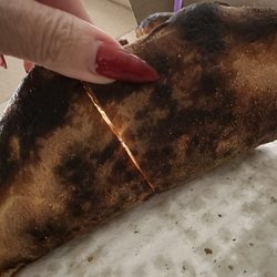 Avivo Brick Oven Pizzeria - Burned pizza.