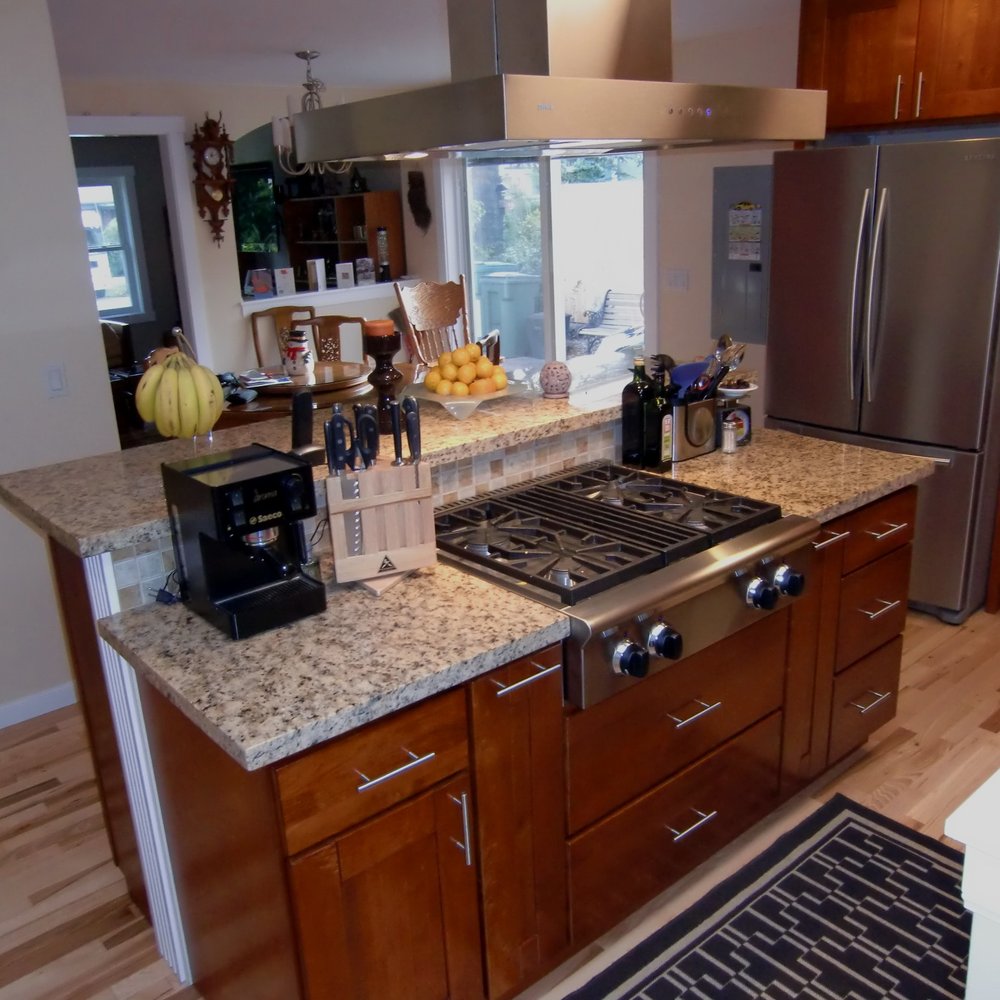 Multi-M Contracting - Remodeled kitchen- island with commercial gas range top - General Contractors Near Me - Seattle, Washington