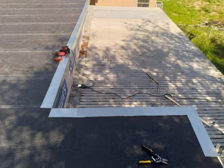 Slide of Bert's Roofing