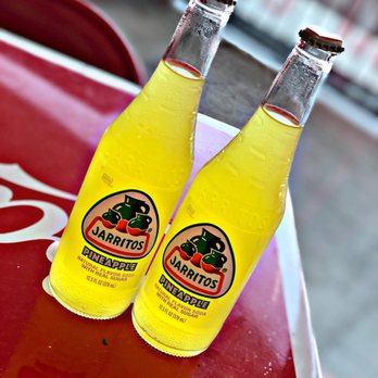 Chilangos Tacos - two bottles on a table - Tacos Near Me - Dallas, Texas