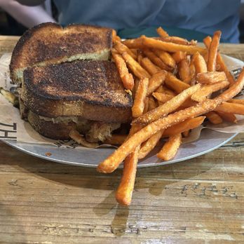 The Mule Edmond - TheMacaroni Pony" sandwich of deliciousness and side of sweet potato fries - Bars Near Me - Edmond, Oklahoma