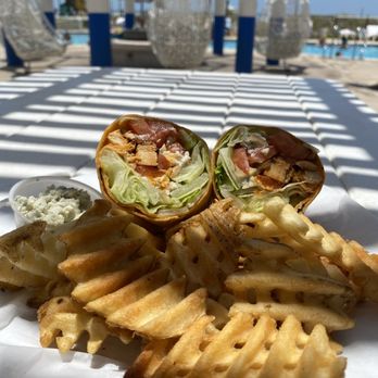 Harry's Beach Bar - Buffalo chicken wrap - Bars Near Me - Saint Pete Beach, Florida