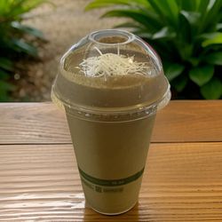 Radiant Juice + Smoothie Bar - Jumping for coconut joy!