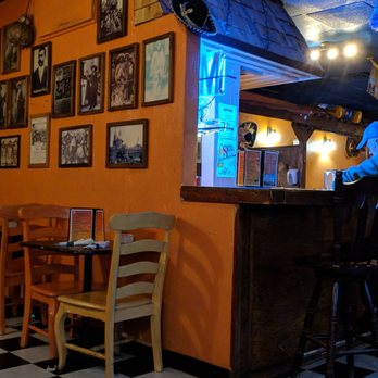 Hacienda Pancho Villa - a man sitting at a bar - Mexican Near Me - Brunswick, Maine