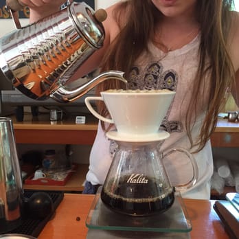 Choco-Latte - Pour over in progress, by the informative staff. This is the Columbia. - Coffee & Tea Near Me - Bar Harbor, Maine Choco-Latte - Pour over in progress, by the informative staff. This is the Columbia. - Coffee & Tea Near Me - Bar Harbor, Maine