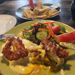 Café Mütlich - Bacon eggs Benedict, salad, crepe with Nutella (in the back).