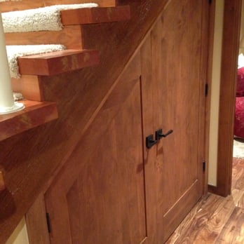 Holm Construction - Custom doors under the stairs hide the washer & dryer. - General Contractors Near Me - Incline Village, Nevada Holm Construction - Custom doors under the stairs hide the washer & dryer. - General Contractors Near Me - Incline Village, Nevada