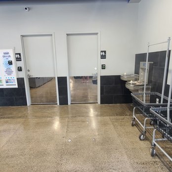 The Laundry Wizard - Interior, water fountain and filling station to the right, bathrooms center, Laundry Wizard cards & payment machines on the left - Dry Cleaning Near Me - Vancouver, Washington The Laundry Wizard - Interior, water fountain and filling station to the right, bathrooms center, Laundry Wizard cards & payment machines on the left - Dry Cleaning Near Me - Vancouver, Washington