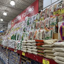 Food Fair Wholesale Fresh Market - A wall of bulk rice bags - big selection!