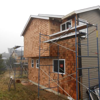 RM Construction - a house being built with scaffolding - General Contractors Near Me RM Construction - a house being built with scaffolding - General Contractors Near Me