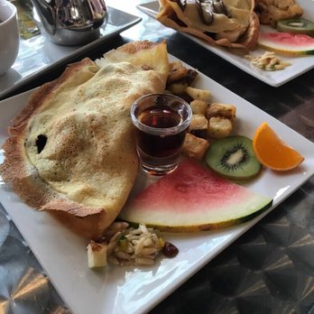Jina Café - a plate of food on a table - Cafes Near Me - Quebec City, Quebec Jina Café - a plate of food on a table - Cafes Near Me - Quebec City, Quebec