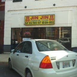 a car parked in front of the restaurant