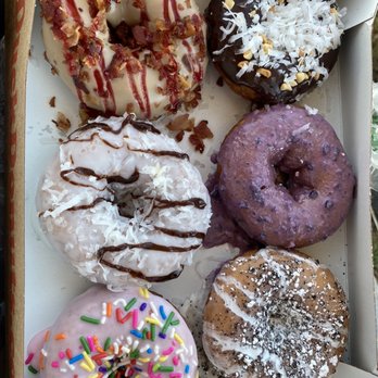 Duck Donuts - Maple syrup w/ Bacon, Coconut Fudge,Coconut Bliss & Blueberry pancake (center) Strawberry Confetti & The Broadwalk (Oreo cookie) (bottom). - Donuts Near Me - Mamaroneck, New York