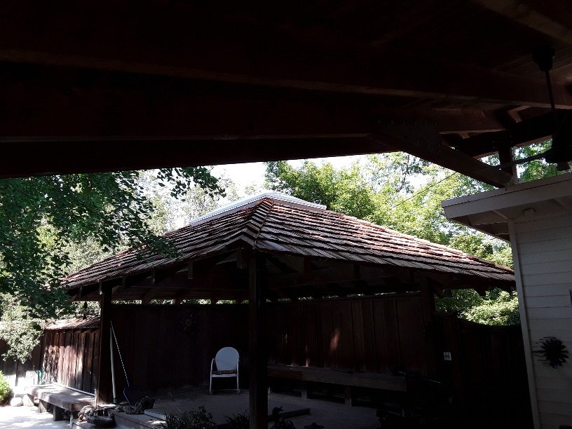 Slide of Efrain Zepeda's Rainbow Roofing