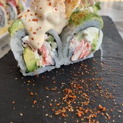 The Plank - Acevichado Roll Kanikama, Cucumber, Cream Cheese Topped with Avocado, Snapper and Shrimp Ceviche