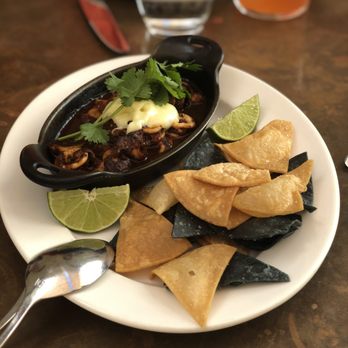 Foreign Cinema - Plancha of Monterey Bay Calamari in Oaxacan-style Mole with chickepeas, lime, aioli, and tortilla chips - Breakfast & Brunch Near Me - San Francisco, California