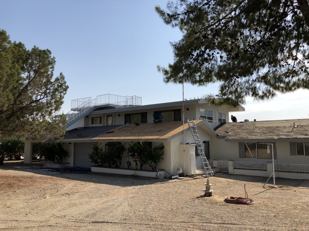 Slide of AMG Roofing